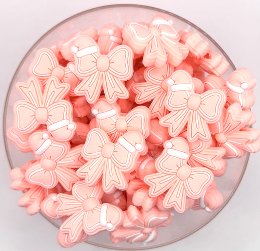 Pink Christmas bow (exclusive) silicone focal bead