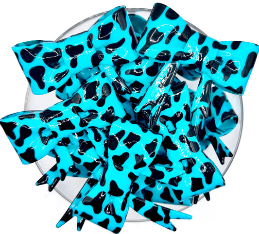 Opal turquoise cow print big bow silicone focal bead
