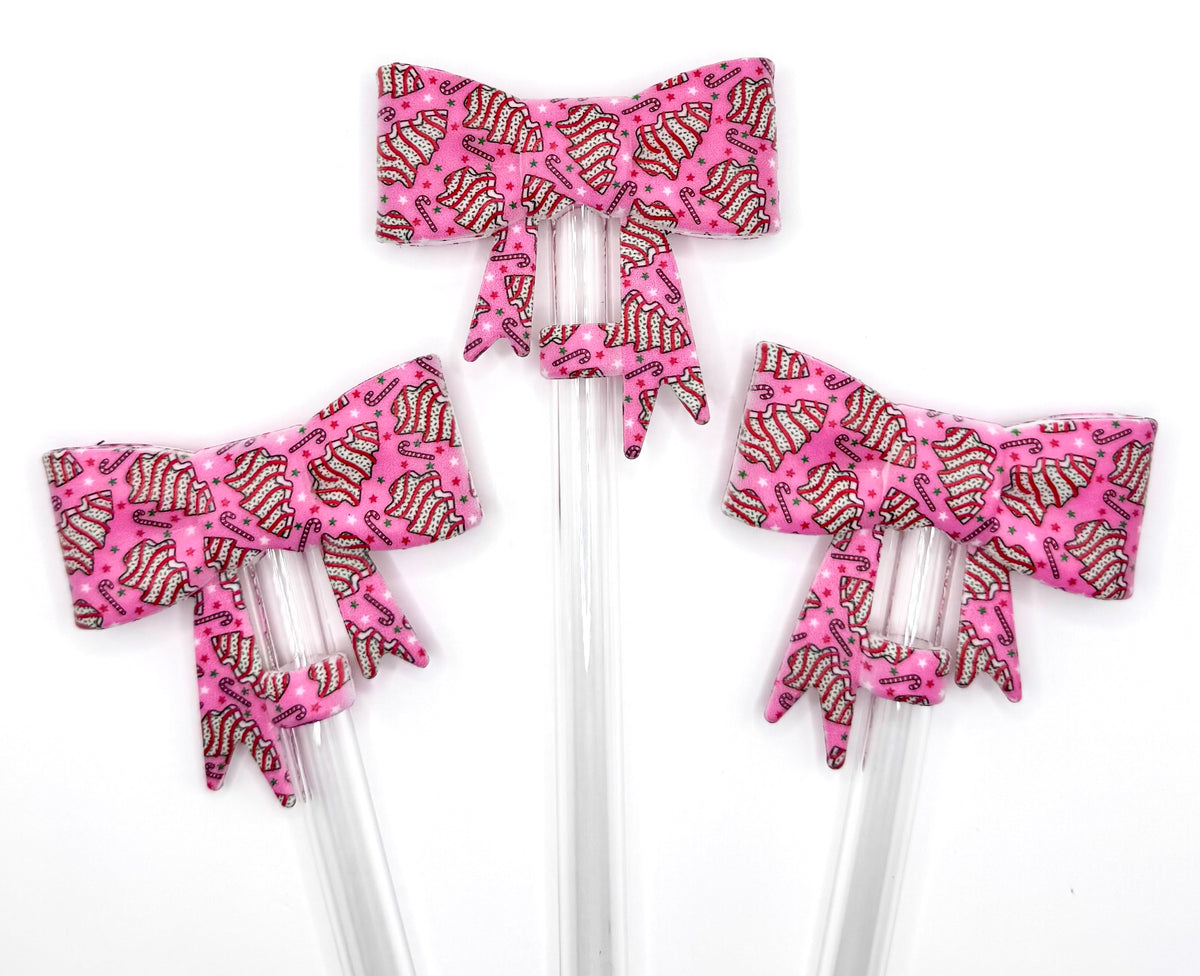Pink Christmas tree cakes big bow silicone straw topper