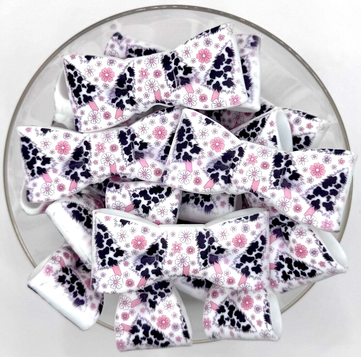 Pink moo-y Christmas bow silicone focal bead