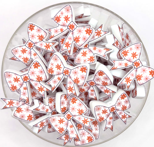 Burnt orange daisy printed bow (HBK exclusive silicone focal bead