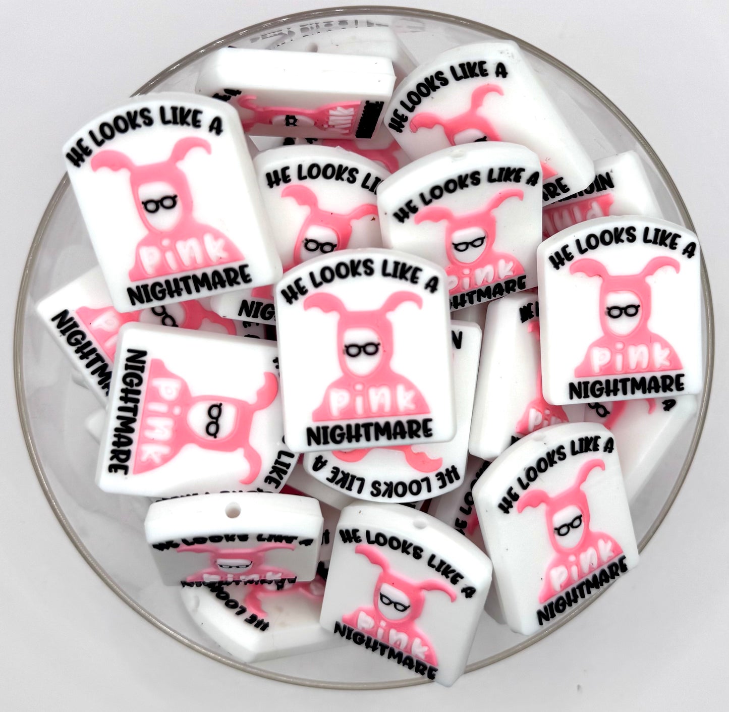 He looks like a pink nightmare silicone focal bead