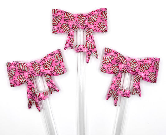 Pink Christmas tree cakes big bow silicone straw topper