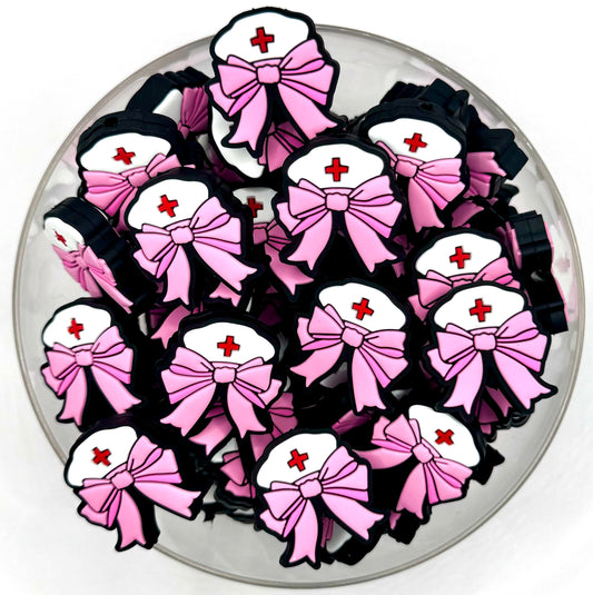 Pink nurse bow silicone focal bead