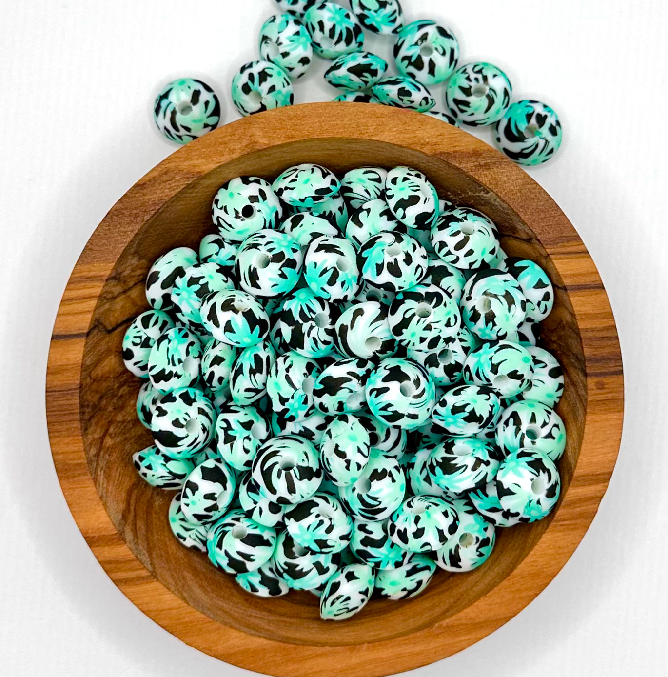 Turquoise and mint daisy cow print (HBK exclusive) 12 mm silicone lentil bead