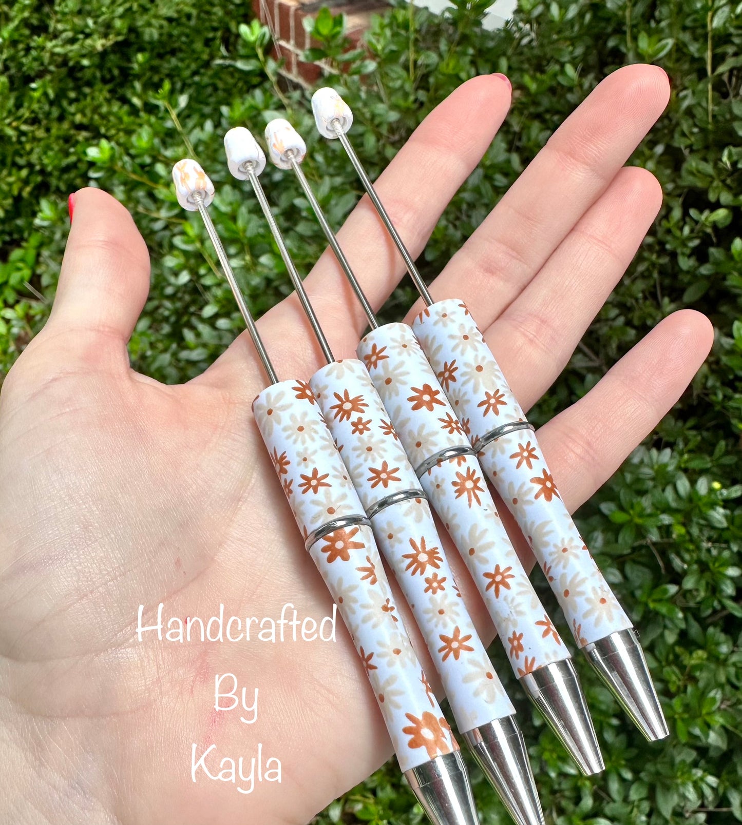 Burnt orange daisy print pen (HBK exclusive)